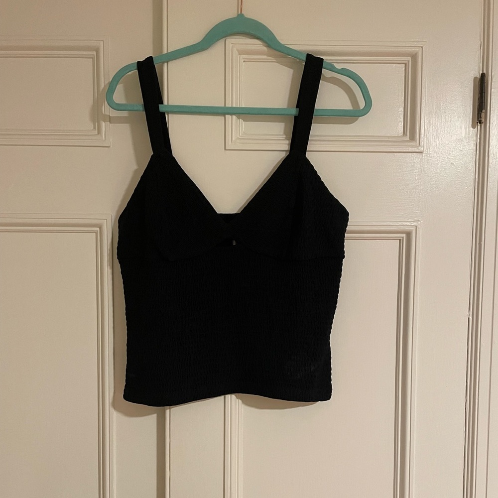 Anthropologie black tank with keyhole accent. Size large. NWT